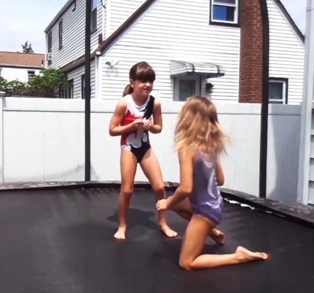 Neighbor dared them to use the trampoline in bathingsuits